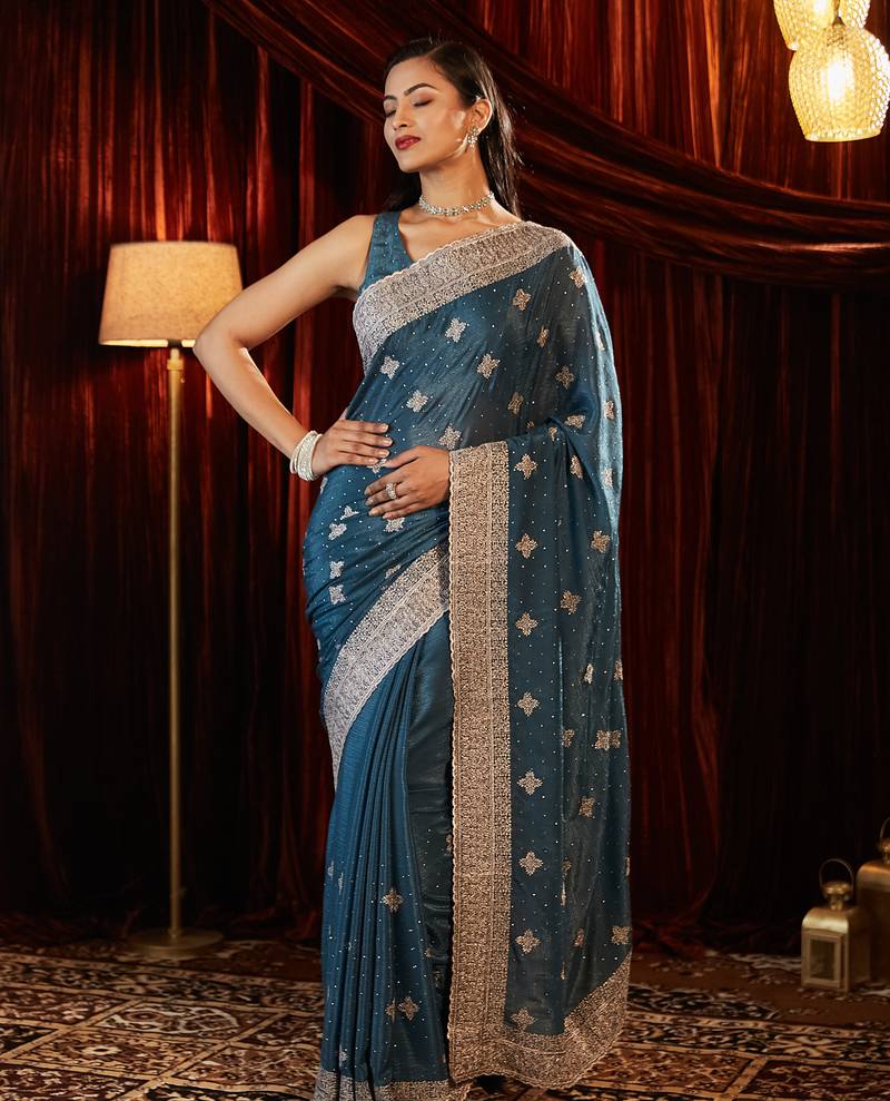 Turquoise blue embroidered chiffon saree