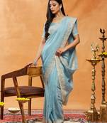 Turquoise blue embroidered chiffon saree