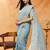 Turquoise blue embroidered chiffon saree