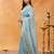 Turquoise blue embroidered chiffon saree