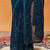Turquoise blue woven embroidered georgette saree