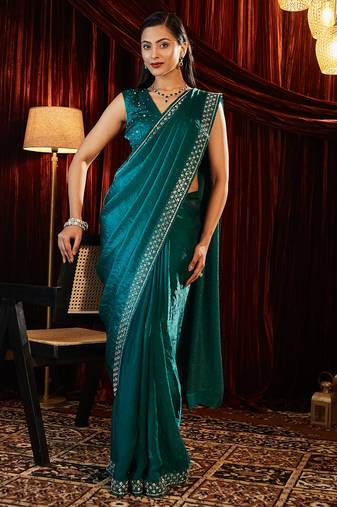 Teal beads and stones embellished saree