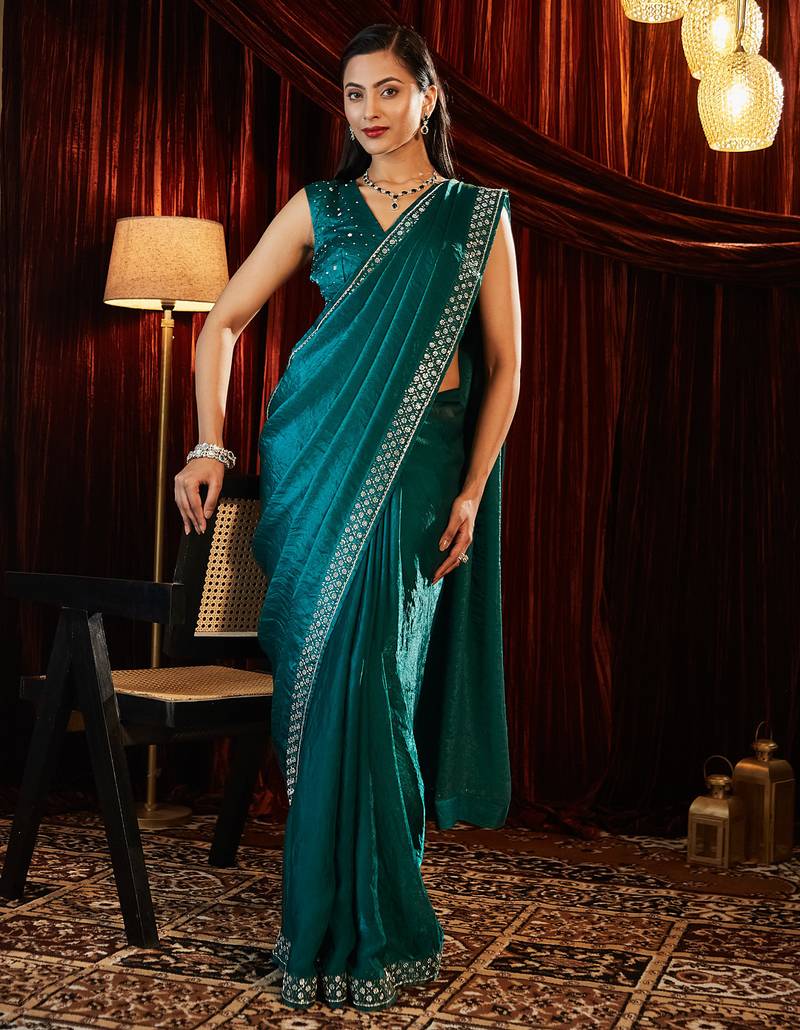 Teal beads and stones embellished saree