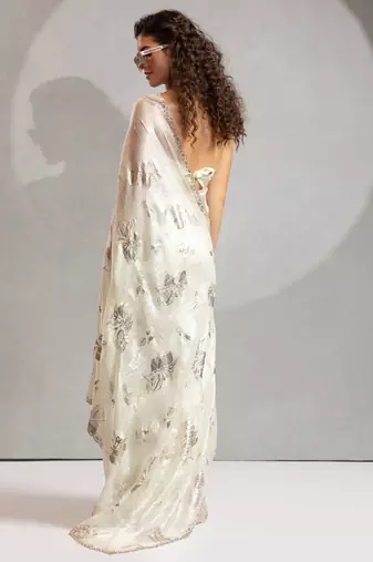cream foil printed two tone silk blend embroidered saree