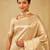 Cream woven zari banarasi saree
