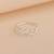Circular criss cross nose pin