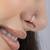 Circular criss cross nose pin