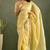 Golden chiffon heavy lace border work party wear saree