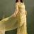 Golden chiffon heavy lace border work party wear saree