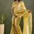 Golden chiffon heavy lace border work party wear saree