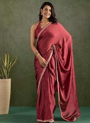 Pink chiffon heavy lace border work party wear saree 1