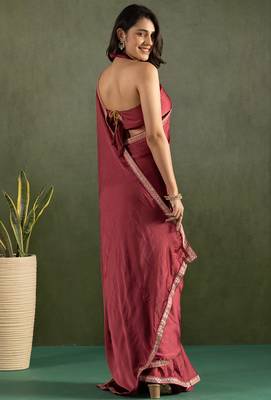 Pink chiffon heavy lace border work party wear saree 2