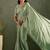 Green chiffon heavy lace border work party wear saree