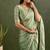 Green chiffon heavy lace border work party wear saree