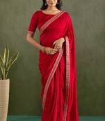 Red chiffon heavy lace border work party wear saree