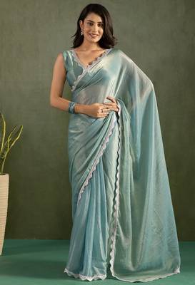 Sea green chiffon heavy lace border work party wear saree 1