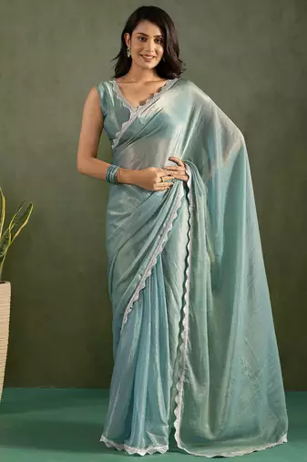 Sea green chiffon heavy lace border work party wear saree
