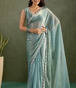 Sea green chiffon heavy lace border work party wear saree