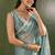 Sea green chiffon heavy lace border work party wear saree