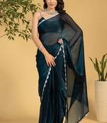 Teal blue chiffon heavy lace border work party wear saree