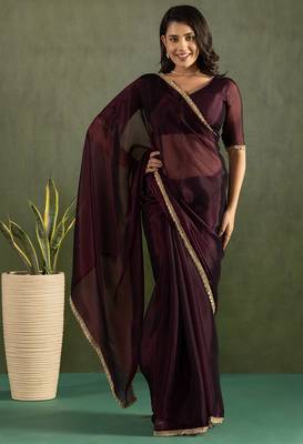 Purple chiffon heavy lace border work party wear saree 1