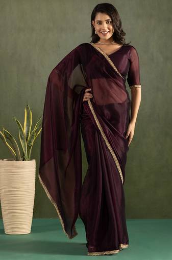 Purple chiffon heavy lace border work party wear saree