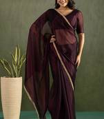 Purple chiffon heavy lace border work party wear saree