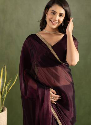Purple chiffon heavy lace border work party wear saree 2