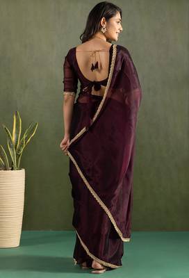 Purple chiffon heavy lace border work party wear saree 5