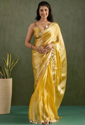 Yellow chiffon heavy lace border work party wear saree 1