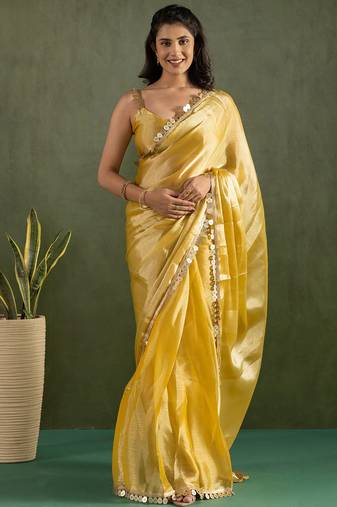 Yellow chiffon heavy lace border work party wear saree