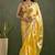 Yellow chiffon heavy lace border work party wear saree