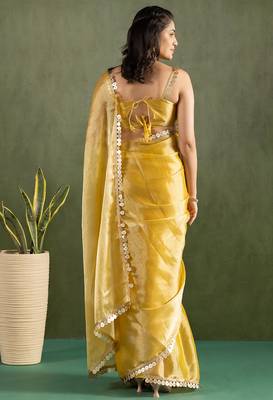 Yellow chiffon heavy lace border work party wear saree 2