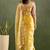 Yellow chiffon heavy lace border work party wear saree