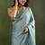 Sky blue chiffon heavy lace border work party wear saree