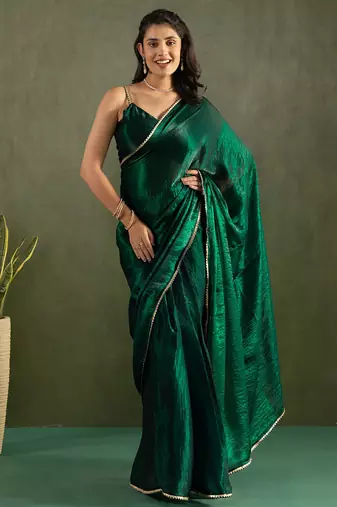 Bottle green chiffon heavy lace border work party wear saree
