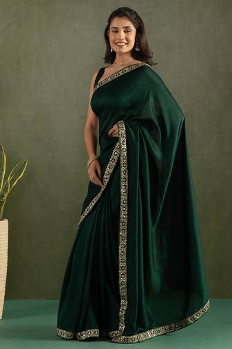 Green chiffon heavy lace border work party wear saree