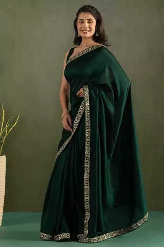 Green chiffon heavy lace border work party wear saree