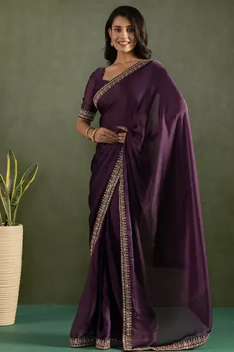 Lavender chiffon heavy lace border work party wear saree