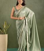 Pista green chiffon heavy lace border work party wear saree