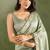 Pista green chiffon heavy lace border work party wear saree