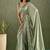 Pista green chiffon heavy lace border work party wear saree