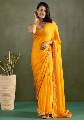 Orange chiffon heavy lace border work party wear saree 1
