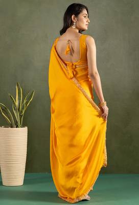 Orange chiffon heavy lace border work party wear saree 2