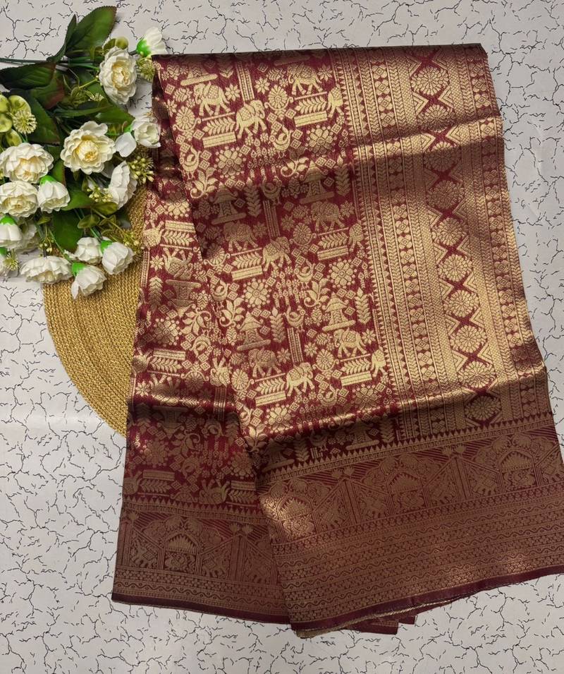 Maroon color silk blend saree with blouse