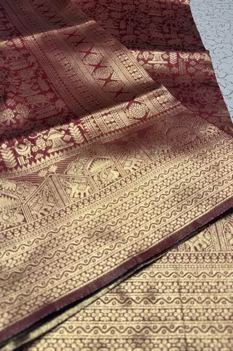 Maroon color silk blend saree with blouse