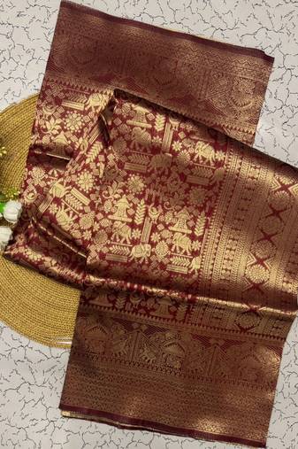 Maroon color silk blend saree with blouse