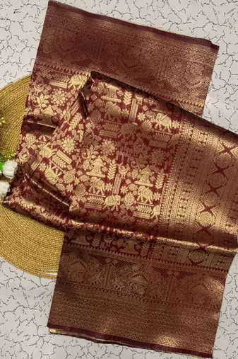 Maroon color silk blend saree with blouse