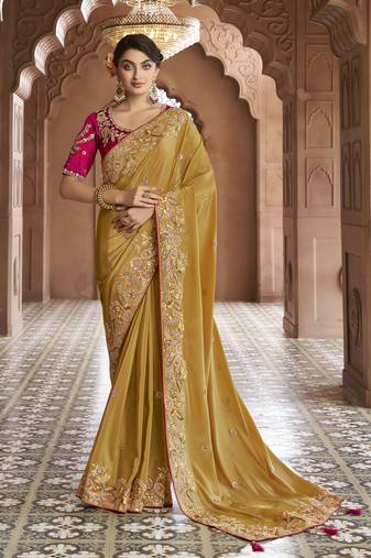 yellow embroidered georgette saree with blouse
