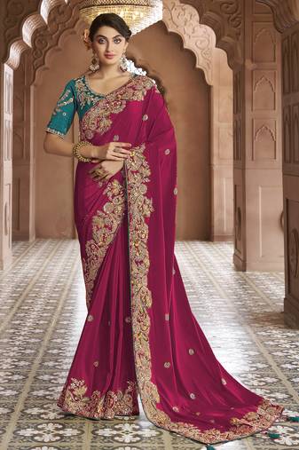 rani pink embroidered georgette saree with blouse